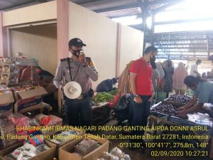 Cegah Penyebaran Covid-19 Bhabinkamtibmas Lakukan Patroli Protokol Kesehatan di Pasar Padang Ganting